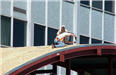 Hall of Justice - June 2001 - people working on roof from distance