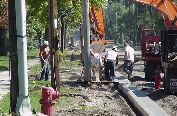 Wastewater 60 Inch Main - October 2001 - replacing curbs and driveways